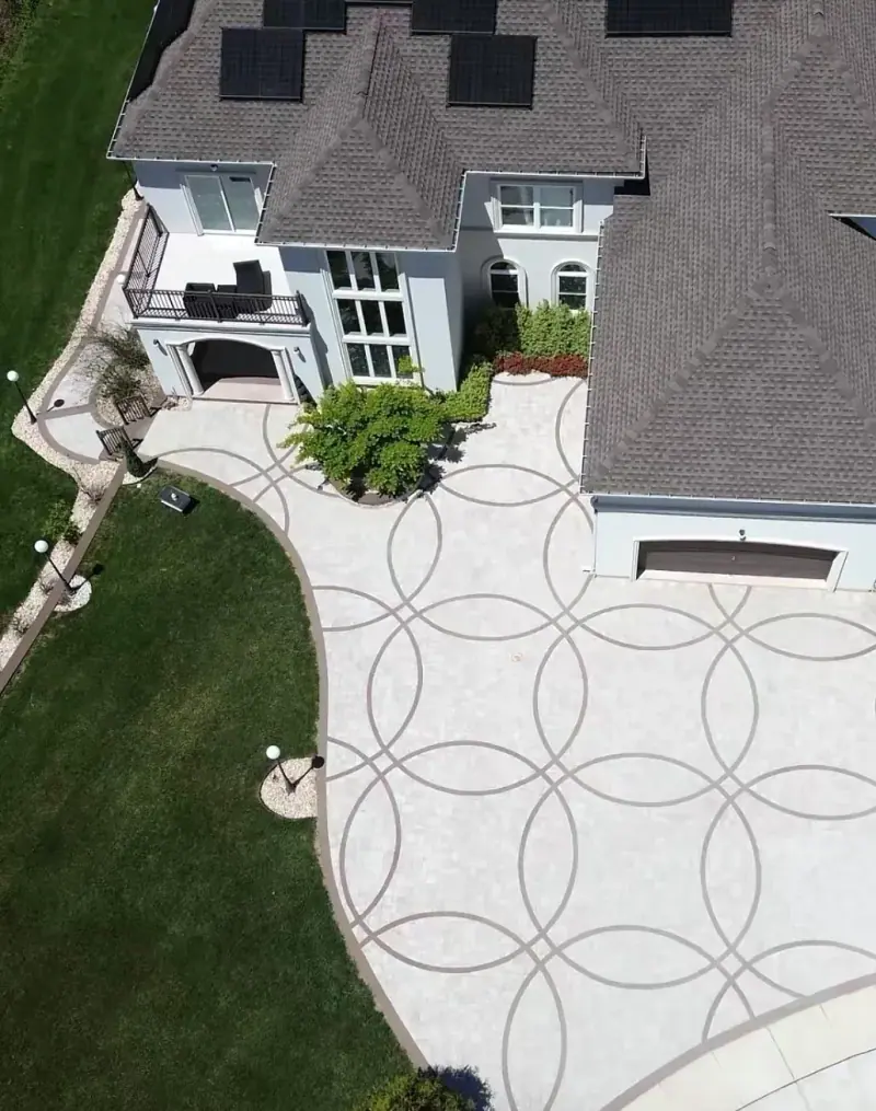 Decorative driveway scored in a circle pattern, A & M Contracting