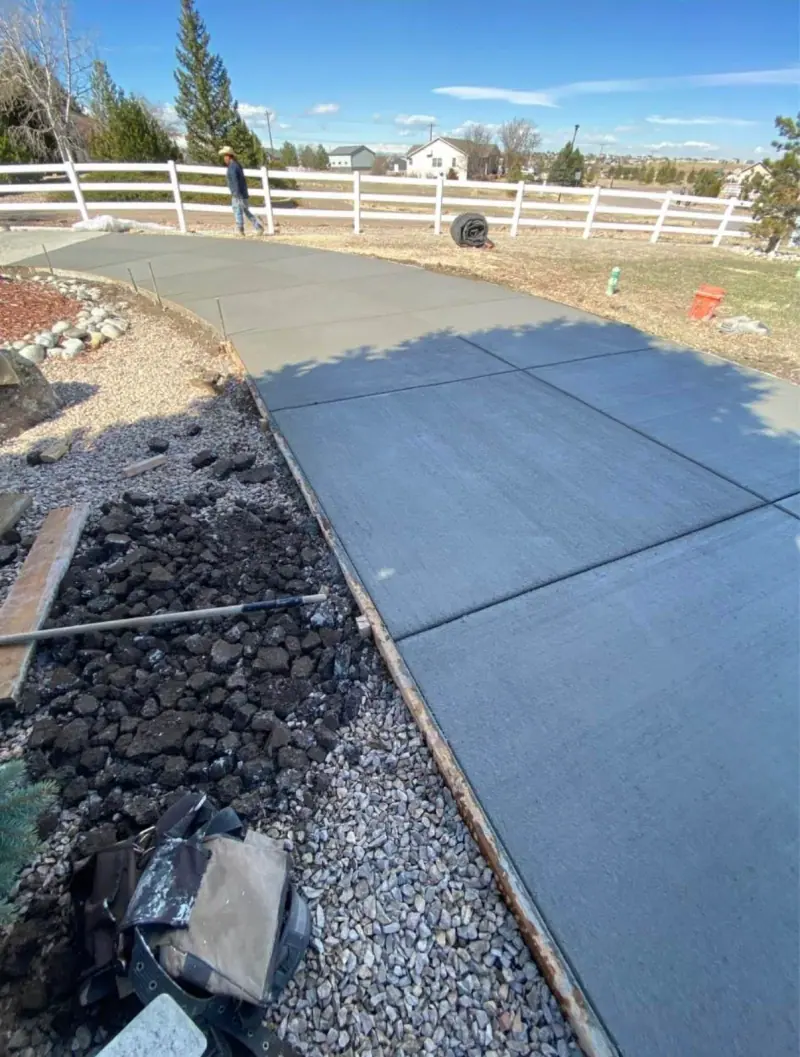 Driveway edge along a rock border, A & M Contracting
