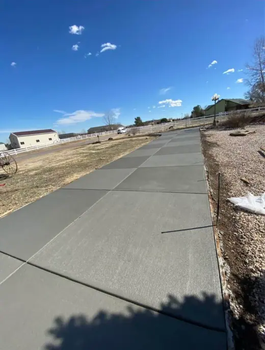 Long driveway poured across open ground, A & M Contracting
