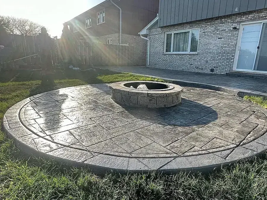 Circular stamped patio around a fire pit, A & M Contracting