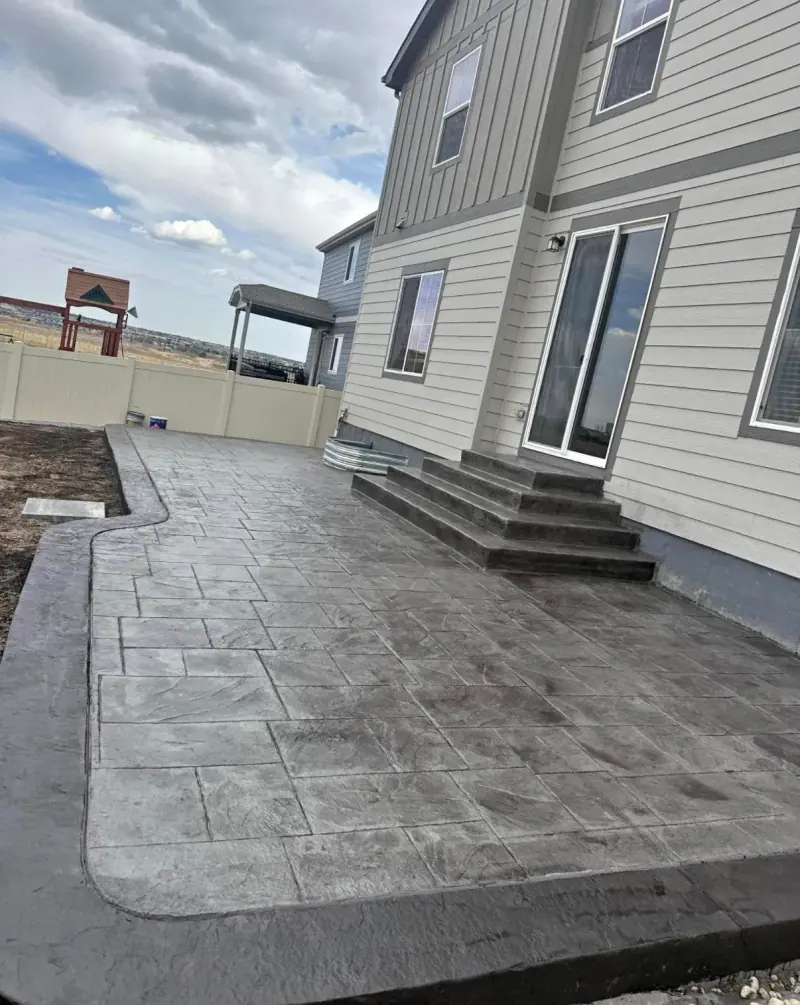 Stamped patio and steps at a new home, A & M Contracting